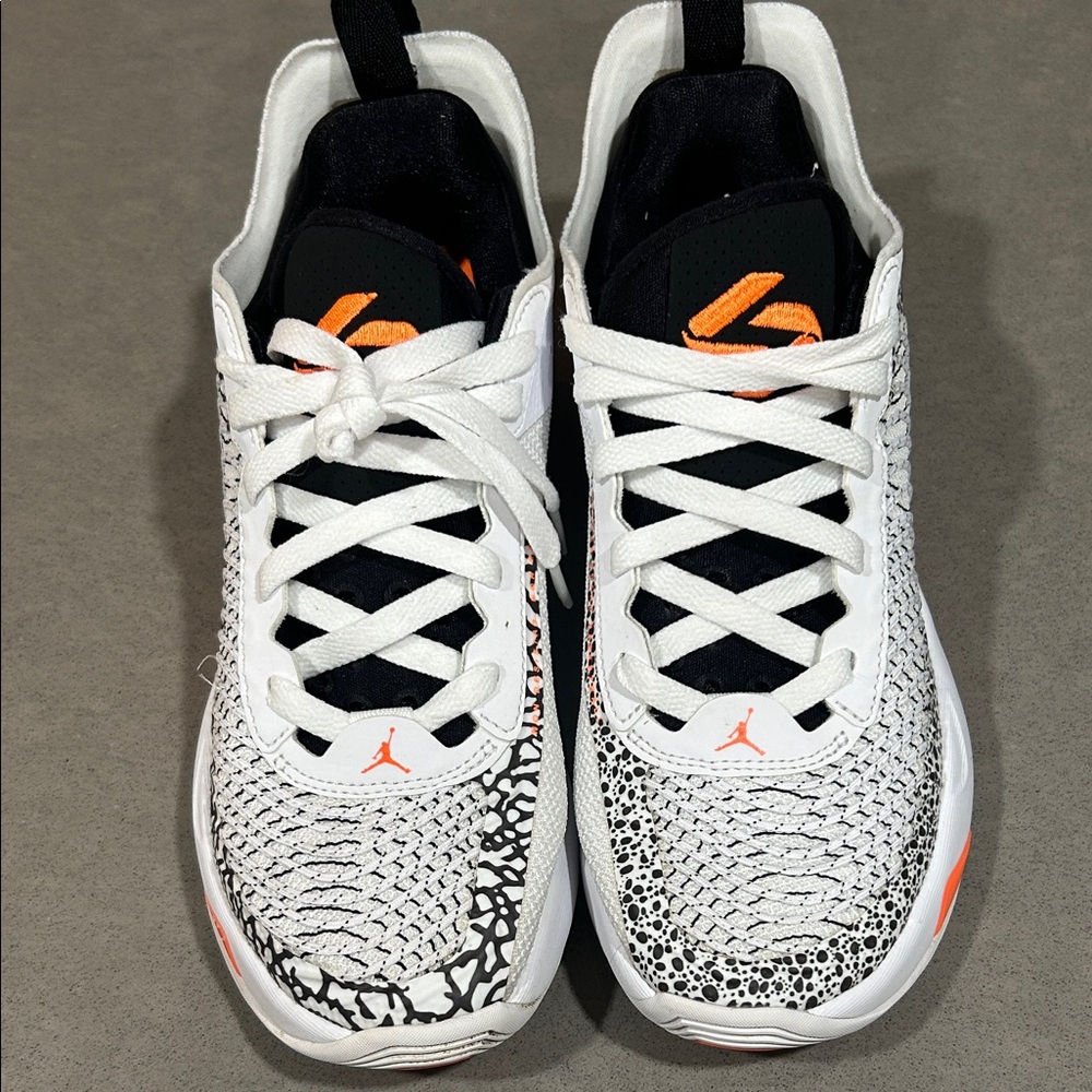 Nike Black and White Sneakers with Orange Highlights